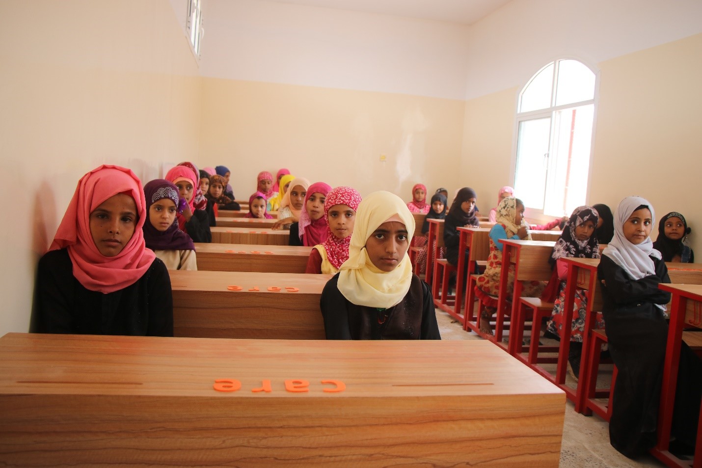 A group of girls in a classroom