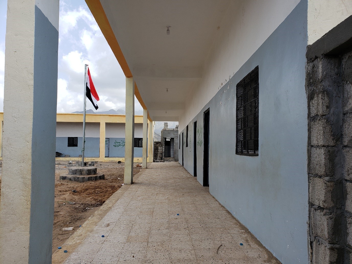 A new building with a flag outside